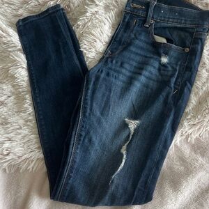 Women's Distressed Blue Jeans